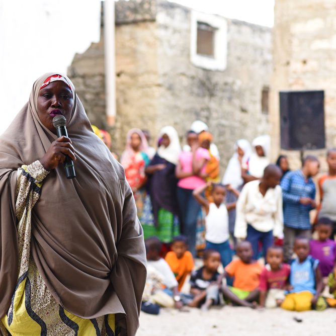 Lamuw A woman in lamu at a public meeting speaking