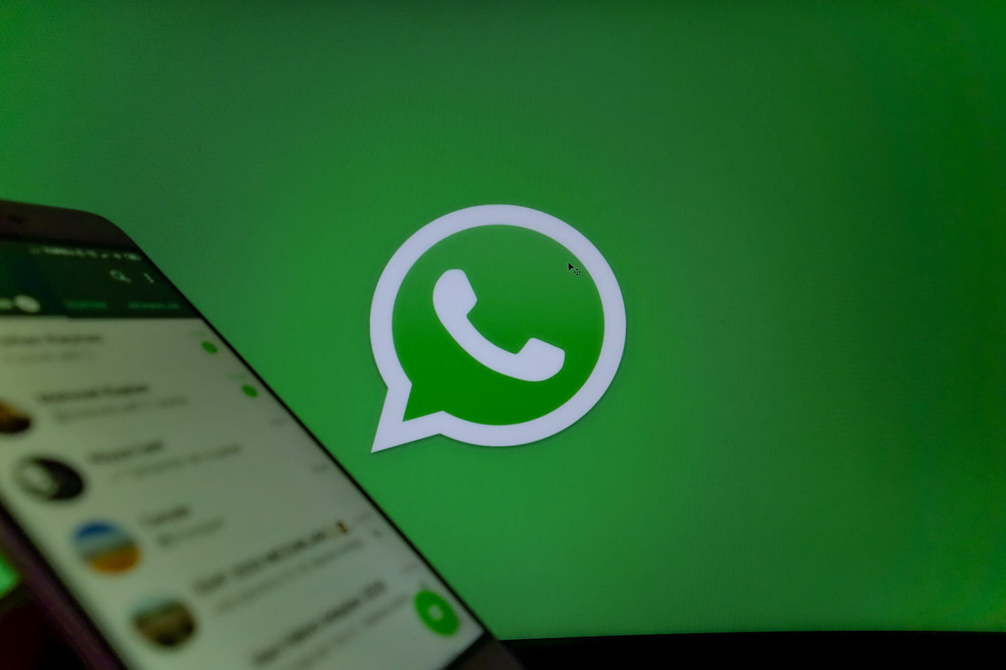 Phone screen showing WhatsApp app