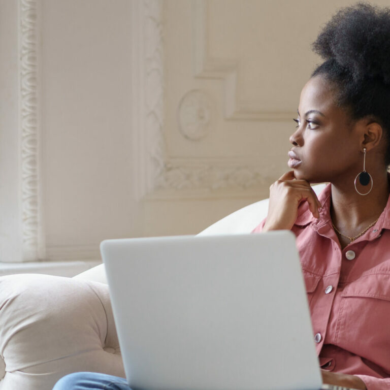 Thoughtful,Serious,African,American,Millennial,Woman,With,Afro,Hairstyle,Wear