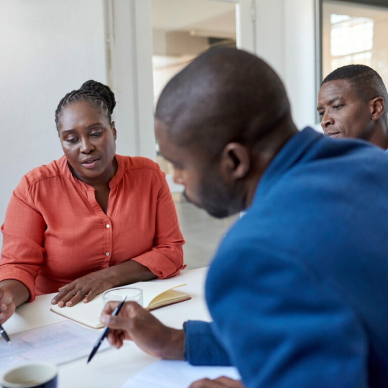 Group of people working at a desk